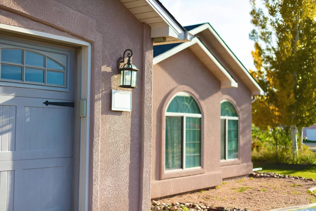 Freshly painted stucco home exterior finished by a house painter in Manitou, CO